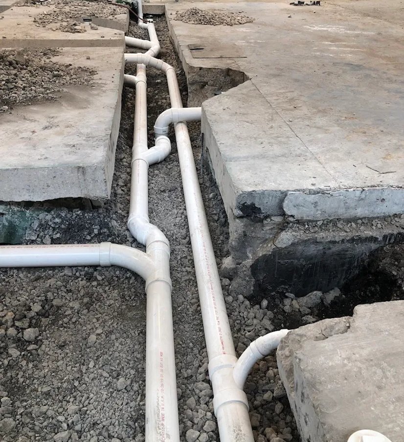plumbing manifold and valve assembly in a mechanical room